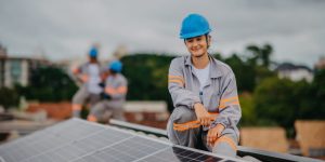 woman working on installation and maintenance of solar panels