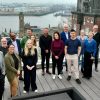 Group picture with Hamburg landscape in the back